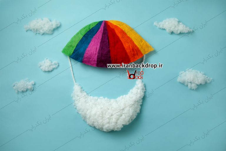 بک دراپ عکاسی نوزادی چتر رنگارنگ با تم پارچه ای کد IBD-6858